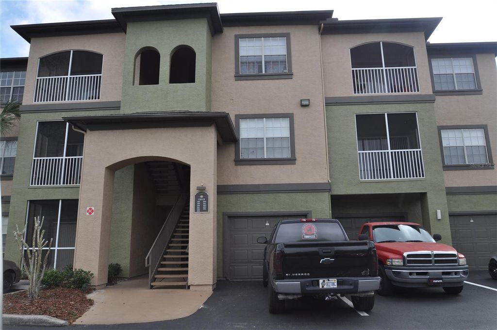 Photo of 13113 Sanctuary Cove Drive #304, Temple Terrace, FL 33637 (MLS # O6394811)