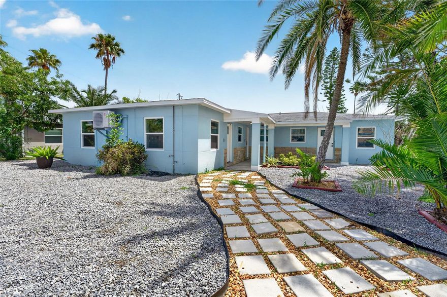 One or more photo(s) has been virtually staged. Newly renovated triplex in desirable Madeira Beach. Three units suitable for many options including multi-generational occupancy and/or rental income. Updates include remodeled kitchens with new stainless-steel appliances and new cabinetry, new lighting and plumbing fixtures, updated electrical, two mini-split systems in each unit, and new double-pane hurricane-impact windows.  The largest unit is the middle unit which has some extra large windows and French doors in the living room. All tile floors, zero carpet!   No HOA fees!  The shed contains a brand new washer and dryer with hookups already in place for future use.  All work has been permitted to current codes and all inspections completed.  This property is just a three-minute drive or a ten-minute walk to the beautiful sparkling beach!  Schedule a private tour of this property as soon as possible!   A beach town gem like this doesn’t come around very often!