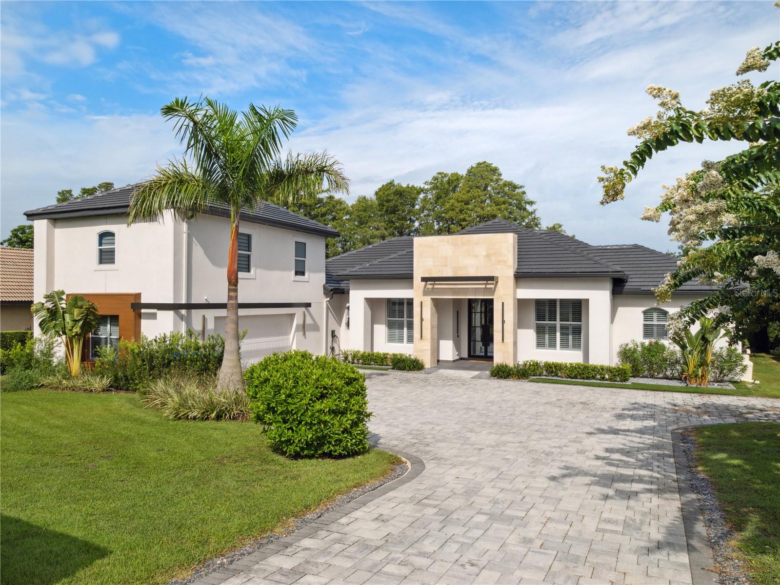 Welcome to 5410 Bay Side Dr — a fully renovated showpiece by Davila Homes that offers the perfect blend of modern design, comfort, and resort-style outdoor living. One of the most beautiful sunsets you will ever see. With over $1M in renovations, this stunning Lake Front home feels like brand new, with sophisticated finishes and clean, contemporary lines throughout.
Step inside to an inviting open-concept floor plan featuring a stylish living area with custom built-ins, sleek wood accents, and large windows that flood the space with natural light. The gourmet kitchen impresses with high-end cabinetry, integrated appliances, and a striking waterfall-edge island — ideal for both entertaining and everyday living.
The spacious primary suite is a true retreat, complete with a spa-like bath and a huge custom walk-in closet. A private office provides the perfect work-from-home setup, while the upstairs in-law suite offers flexibility for guests or multigenerational living.
Your outdoor oasis awaits — on the shores of Lake Butler Chain enjoy a sparkling pool overlooking the water a summer kitchen, fire pit, and private dock, all set against the backdrop of breathtaking lake views and amazing sunsets.
Ideally located just minutes from Orlando’s famed Restaurant Row, top-rated schools, and world-class shopping — this is lakefront living at its finest.
Don’t miss this rare opportunity — schedule your private tour today!