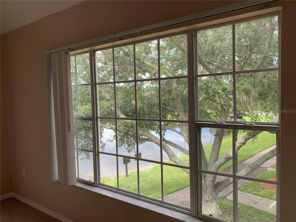 Photo of 9832 Lake Chase Island Way, Tampa, FL 33626 (MLS # TB8504475)