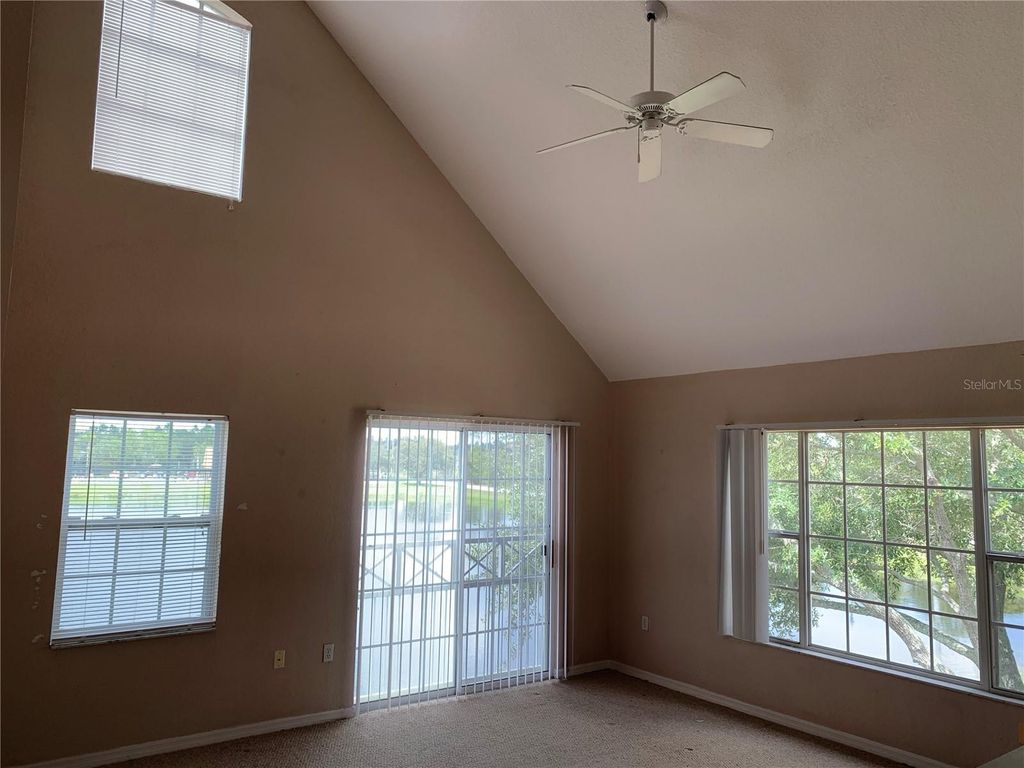 Photo of 9832 Lake Chase Island Way, Tampa, FL 33626 (MLS # TB8504475)