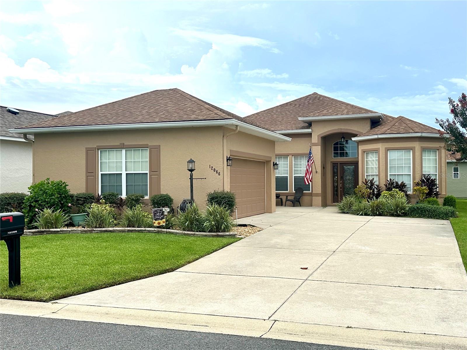 Welcome to beautiful STONECREST a 55+ golf club community. This gorgeous FULLY FURNISHED, TURNKEY with GOLF CART, St. George model has 1908 sq ft of indoor living space and nearly 3000 under roof is located in the very desirable Links 3. Featuring a glass enclosed Florida Room and Lanai offering beautiful water views. From the moment you enter the front door you will be impressed with the grand stature of the 12 ft. ceilings and beautiful architecture. This stunning home has been beautifully updated and renovated with a new roof in 2020, stainless appliances, crown molding, beautiful primary en-suite with oversized tile shower, spacious walk-in primary closet and a 2-car extended garage with extra space to store your GOLF CART! Stonecrest is a golf cart community with easy access to all your favorite shopping and The Villages just minutes away by cart. Enjoy this lovely community with low association fees, NO BONDS or additional unexpected maintenance fees. Stonecrest boasts 4 swimming pools (one indoor) hot tub, pickleball and tennis courts, newly renovated fitness center, softball field, dog parks, walking trails, community center and over 90 groups and associations offering something for everyone.