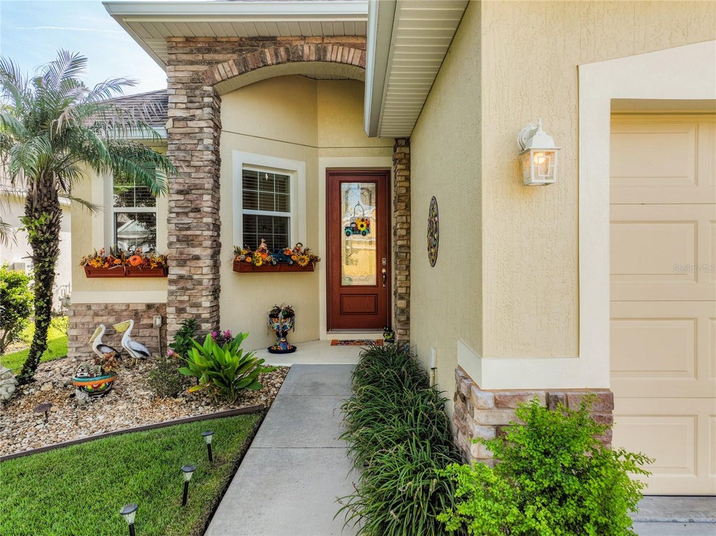 Photo of 8290 Bridgeport Bay Cir, Mount Dora, FL 32757 (MLS # G5117966)