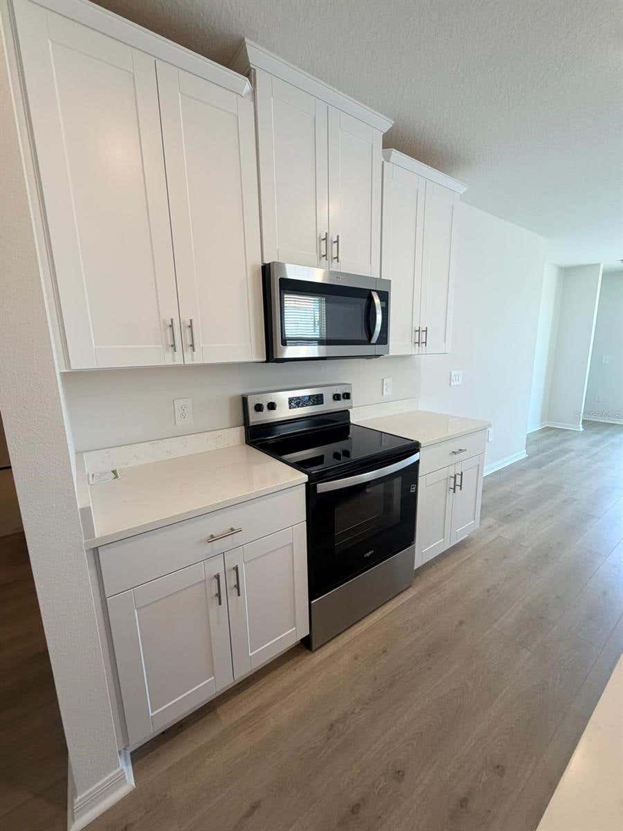 Photo of 5229 Native Mile Loop, Davenport, FL 33837 (MLS # O6418228)