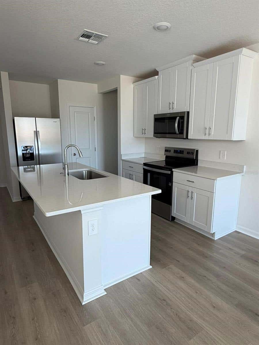 Photo of 5229 Native Mile Loop, Davenport, FL 33837 (MLS # O6418228)