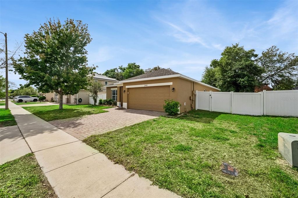 Photo of 240 Whispering Pines Way, Davenport, FL 33837 (MLS # O6395457)