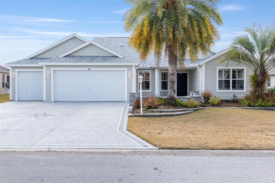 BOND is PAID!!! -- Roof 2022 -- Village of SABEL CHASE – CAMELLIA Designer Model with GOLF CART Garage & ENCLOSED Florida Room! *  Built 2006, this 3 Bedroom 2 Bath Home offers 2,179 Enclosed Sq Ft (1,927 Base + Florida Room with 252 sq ft/not under main unit air) ** With  2-Car Garage AND Golf Cart Garage, High & Vaulted Ceilings, PLANTATION Shutters Throughout, GAS HOME, Custom Painted Driveway, Walkway & Front Porch. - ROOF: 2022, HVAC: 2016. - Tile in Kitchen, Baths, Laundry Room & Foyer, NEW CARPET & FRESHLY PAINTED INSIDE! - The Kitchen Boasts QUARTZ Countertops with TILED BACKSPLASH, Breakfast Bar Overhang, STAINLESS STEEL UPDATED APPLIANCES, Raised Panel Cabinets with Pull-out Shelving, Corner Cabinets, Cabinet Pantry and EXTRA CUSTOM BUILT-IN PANTRY. The Dining Room and Living Room are Spacious and Open. There are Glass Sliders off the Living Room leading to the Florida Room (Not Under Heat & Air) featuring Acrylic Slider Windows with Screens, Accordion Blinds, and Glass Sliders to the Owner’s Bedroom. The Owner’s Suite has a Foyer Entry, a 19 Ft x 14 Ft Bedroom with 10 Ft and Vaulted Ceiling, TWO WALK-IN Closets with Pocket Door Entry & Extra Wire Shelving. The Owner’s Bath includes a Linen Closet, QUARTZ TOPPED L-Shaped Vanity with 2 Sinks and Makeup Area, Private Privy with Pocket Door Entry, and a Step-in Shower with Solid Surface Walls and Bench Seat. The Guest Wing offers Bedroom 2 (Den/Office) in Front (No Closet), Bedroom 3 with Closet and Side Yard Window, and a Guest Bath with Tub/Shower Combo with Tile Walls, Grab Bars, Single Vanity & Medicine Cabinet. - The INSIDE Laundry Room features a Louvered Entry Door, Wall Mounted Cabinets, GE Washer and GE GAS Dryer. The 2 Car PLUS Golf Cart Garage is L-Shaped with Pull-down Attic Stairs, HVAC Cabinet with Louvered Doors, and Irrigation System. Buyer to Verify all Measurements and Information. BOND IS PAID! Unit 118 Maintenance (CDD): $464.21/yr, - The Villages Fire District: $320.71/yr. - Other Fees: $204/per month (Amenity Fee) -- Don’t miss the Attached Video Tour of this Home in a GREAT LOCATION!