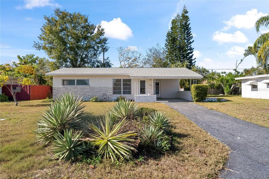 Charming 2-bedroom, 1-bath home with a bonus room in Port Richey, just minutes from Gulf access, boating, and local amenities! This home features terrazzo floors throughout, a newer roof (2019), and updated water and sewer lines from the street, providing both style and peace of mind. Enjoy a covered carport for protected parking, a freshly painted exterior, and bright, open living spaces. The quiet neighborhood and generous yard offer plenty of room for outdoor enjoyment. Move-in ready and perfectly located for coastal Florida living!