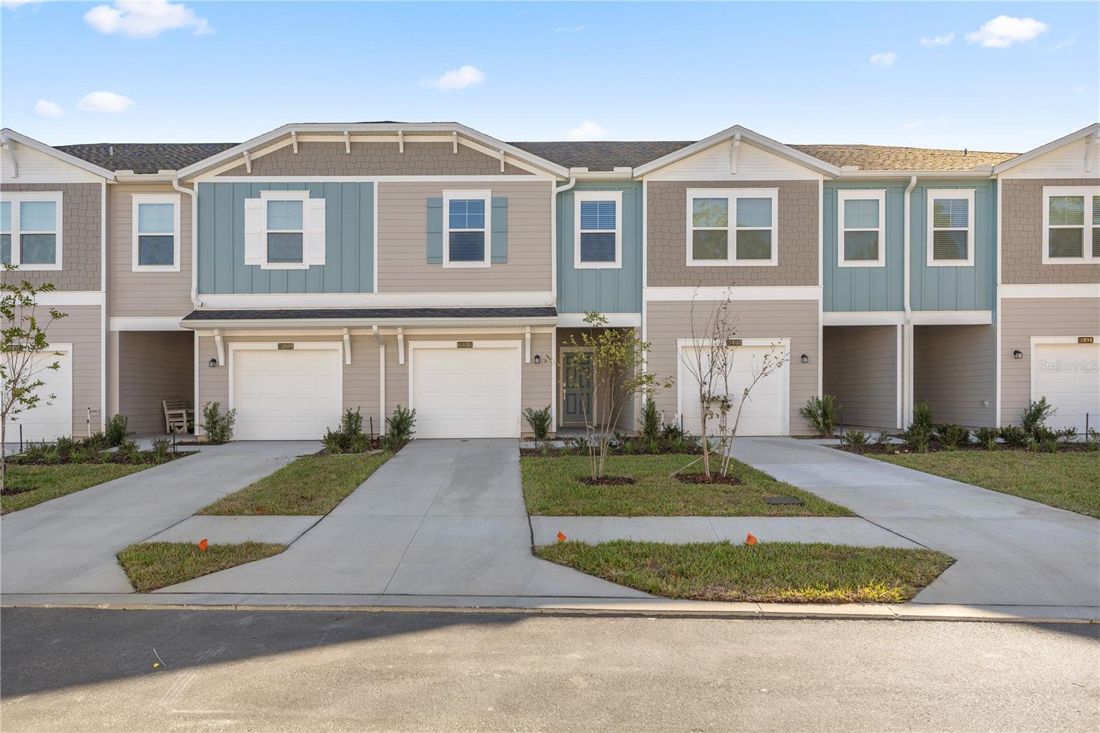 One or more photo(s) has been virtually staged. 2024 3 Bedroom, 2.5 Bath Townhouse in Oak Hammock. This stunning townhouse features a modern eat-in kitchen equipped with white wood cabs, stainless steel appliances, quartz countertops and recessed lighting. The main level has 1/2 bath & wood look tile flooring, while the upstairs bedrooms are comfortably carpeted. The large primary bedroom includes a walk-in closet, an ensuite bathroom with a double vanity and a walk-in shower. Enjoy relaxing on the covered lanai, perfect for outdoor enjoyment. The location is convenient, with shopping and restaurants nearby. Lawn care, trash, high speed internet, roof replacement & ext insurance are included in HOA. Electric (Duke Energy) Water (Marion Utilities). Additionally, a pool is planned to be completed spring of 2026, providing even more amenities for residents to enjoy. Possible OWNER FINANCING, LEASE OPTION, RENTAL. Possible short term rental. Don't miss out on this beautiful property! OWNER / AGENT