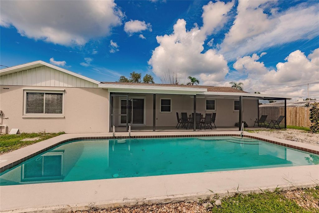 Photo of 1099 Iowa Avenue, Englewood, FL 34223 (MLS # A4659809)