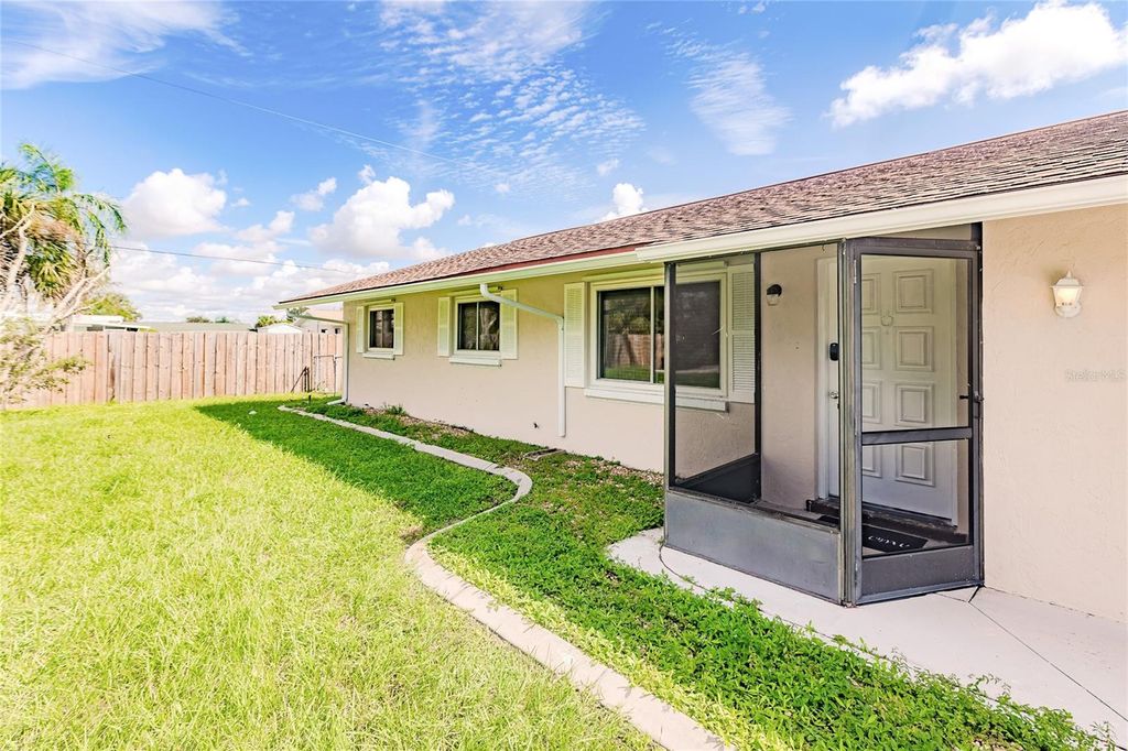 Photo of 1099 Iowa Avenue, Englewood, FL 34223 (MLS # A4659809)