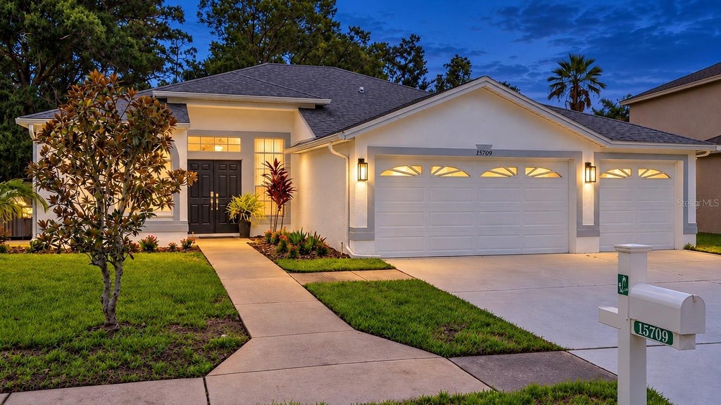 Photo of 15709 Muirfield Drive, Odessa, FL 33556 (MLS # TB8551966)