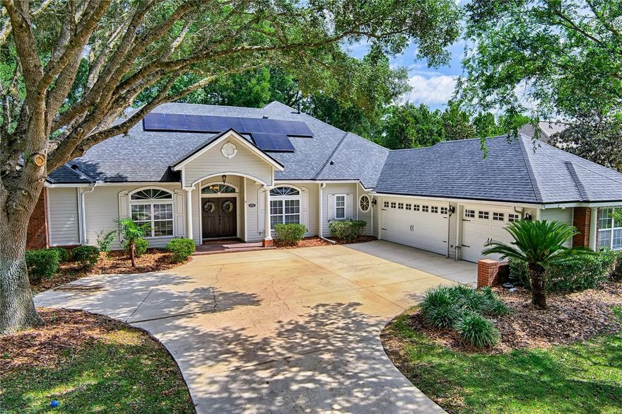 Introducing this beautiful 4-bedroom, 4-bath pool home featuring top-of-the-line solar panels, two EV charging stations, and a backup battery system. Located in the highly desirable Prestonwood section of Haile Plantation, this home blends comfort, efficiency, and convenience. Step through the double doors and you’re welcomed by wide-plank luxury vinyl flooring, 12-foot ceilings, and a spacious bonus area overlooking the screened-in pool and private backyard. The open kitchen flows seamlessly into the great room, where a vaulted ceiling and fireplace create a warm, inviting space for gatherings. Enjoy the Florida lifestyle on the screened-in lanai and pool deck — perfect for cooling off with a swim or relaxing with a cold drink. The split floor plan offers plenty of privacy, along with an Office/5th Bedroom and an upstairs Bedroom/Bonus room complete with its own bathroom. Storage is abundant thanks to the 3-car garage and easily accessible attic space. The home’s solar system includes 56 panels with Enphase microinverters — considered the gold standard — providing approximately $2,000 per year in energy savings since installation in 2021. Additional upgrades include a new roof (2021) and brand-new carpet in the bedrooms. The neighborhood offers unbeatable convenience with nearby Publix, restaurants, and top-rated schools. Haile Plantation is known for its scenic walking trails, parks, and close proximity to Haile Village, home to a popular Saturday farmers market. Hawkstone Golf and Tennis Club is just minutes away, and commuting to UF, Shands, the VA, and HCA hospitals is quick and easy.