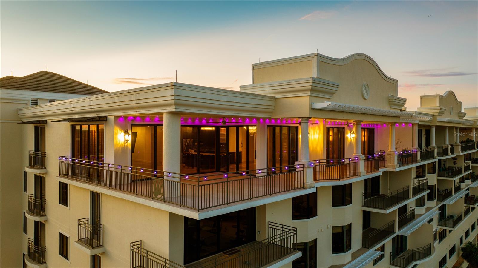 PENTHOUSE PERFECTION MEETS DOWNTOWN RENAISSANCE
Discover the crown jewel of Historic Downtown Kissimmee – an architect-designed penthouse that redefines luxury living in Central Florida's fastest-growing corridor. This one-of-a-kind executive residence spans 3,577 sq ft on the coveted 8th floor, offering breathtaking panoramic views of Lake Toho and the revitalized downtown skyline from nearly every room. UNMATCHED SCALE & SOPHISTICATION
The only 4-bedroom penthouse in downtown Kissimmee's high-rise market features soaring 10-foot ceilings, two expansive living areas, and over 1,200 sq ft of private wrap-around balcony. All floors are custom epoxy Dreamcrate. Originally designed by the building's architect as his personal residence, this home showcases custom architectural details and luxury proportions impossible to replicate. CHEF'S KITCHEN & ENTERTAINING SPACES
Gourmet kitchen featuring premium appliances, oversized island, French-door refrigerator, and built-in wine cooler flows seamlessly into lakefront dining and living areas. The private balcony creates an exceptional entertaining environment with sunrise coffee nooks and sunset cocktail destinations. LUXURIOUS PRIMARY RETREAT
Master suite showcases wall-to-wall lake views, custom walk-in closet systems, and spa-inspired bathroom with soaking tub and dual vanities. Additional bedrooms include a sophisticated home office/flex space with built-in storage and designer finishes throughout. PRIME LOCATION IN A GROWTH CORRIDOR
Positioned in the heart of Historic Downtown Kissimmee's $100M+ revitalization, steps from the new 30-acre Lakefront Park, upscale dining, and cultural venues. Just 1 mile from the transformative NeoCity Semiconductor Park and minutes from Lake Nona Medical City – economic engines driving unprecedented demand for luxury housing in this emerging market.
RESORT-STYLE BUILDING AMENITIES
Secure entry, assigned covered parking, 2 Storage Units on 2nd Floor and elevator access to your private penthouse sanctuary. Building features modern architecture with downtown walkability to SunRail, Amtrack, major highways, and Orlando International Airport.
INVESTMENT IN EXCELLENCE
This flagship residence represents the pinnacle of downtown Kissimmee living, offering Orlando luxury at an exceptional value. The combination of irreplaceable architecture, substantial improvements, and strategic location creates a once-in-a-lifetime opportunity in Central Florida's most dynamic growth market.
Schedule your private showing to experience penthouse living where sophistication meets opportunity.