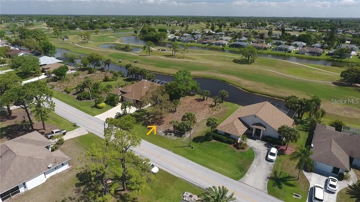 The Only Lot in Rotonda West Offering Both Waterfront and Golf Course Frontage!
Welcome to a rare gem in Rotonda West — the only currently listed lot that boasts both waterfront and golf course frontage. This exceptional property offers breathtaking 180-degree panoramic views of shimmering water and lush fairways, all from the comfort of your future dream home.Imagine waking up to sweeping vistas framed by oversized picture windows and zero-corner sliding doors. Let your living space spill into the outdoors with a stunning infinity pool, seamlessly blending into the tranquil pond and gently rolling greens beyond. Indoors and out, this lot invites the gentle subtropical breezes, the scent of fresh-cut grass, and the peaceful sounds of nature to become part of your everyday life.
You’ll be captivated by the ever-changing landscape: osprey, heron, and eagles swooping down to fish from the pond, jovial golfers passing in the distance, and palm fronds swaying to the rhythm of coastal winds. As evening falls, relax on a park bench under a mature oak draped in Spanish moss, and enjoy the moonrise casting a soft, surreal glow across the water and fairways. The chorus of crickets, owls, and seasonal whippoorwills completes the idyllic, resort-like setting.
In addition to the natural beauty, this lot offers real, tangible benefits:
Free irrigation water from the golf course ponds (available for a one-time hookup fee), a perk enjoyed by homeowners along the fairway — contributing to the lush, vibrant landscaping seen throughout the area.
Prime location just 1/3 mile from the western entrance to Rotonda West, saving you valuable time and gas. Unlike lots deeper inside the circle, this one keeps you close to shopping, beaches, and other essentials.
And finally, beyond the day-to-day joy of living in such a spectacular setting, this lot offers long-term advantages as well. The unmatched views and rare dual-frontage location significantly enhance your home’s future resale value, making this a wise investment in both lifestyle and equity.
Don’t miss your chance to own the most desirable lot in Rotonda West — where water meets fairway and dreams meet reality.