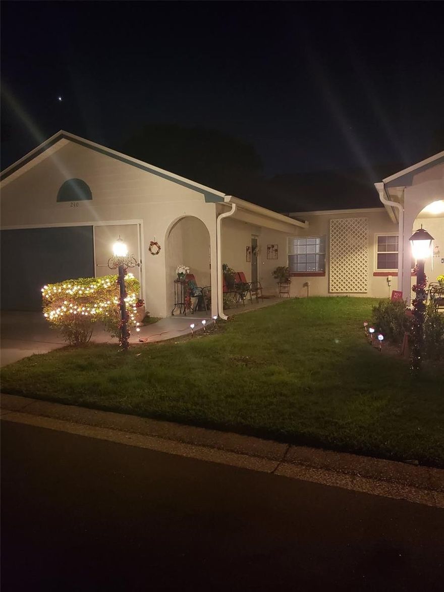 If u have dreams of being 1 block from the water, here's your affordable opportunity. Cherry knoll is a small subdivision,  3 dead end streets, with lake access to big lake minneola, dock, clubhouse. Private lake access & boat slips- ideal for boating enthusiasts or anyone who enjoys the water. You can get a boat space - no fee to purchase (stipulations apply). Lake minneola allows u to travel thru the chain of lakes. Cherry knoll is directly in front of lake minneola and the bike trail. Walk 1 block to the waterfront park of Clermont, to their boat ramps, splash pad. Beach area, covered pavilion for concerts & festivities. Owners took great pride in this townhome. Kitchen at one end, opening to a great room (easily used for dining rm on one side, living room on other.) You will enjoy the split bedroom feature with front bedroom area & bath closed off for privacy with sliding door. Primary bedroom with it's own bath at other end. Florida rm with French doors to the great room. (FL rm not a.c'd- owners keep doors open, ac comes in from great rm). Small patio area on back. Quaint covered front porch area on front. Walk 1 street over to the community pool, use the clubhouse for those special occasions (fee may apply). Recent updates w/in appx last 4 yrs: roof, skylights, gutters. AC & hot water heater updated ( owner needs to confirm date). Cherry knoll delivers a lifestyle that combines comfort, low maintenance living, & enviable access to lk minneola's recreational offerings. (Photos taken prior to family clearing out home) Chandelier does not convey.