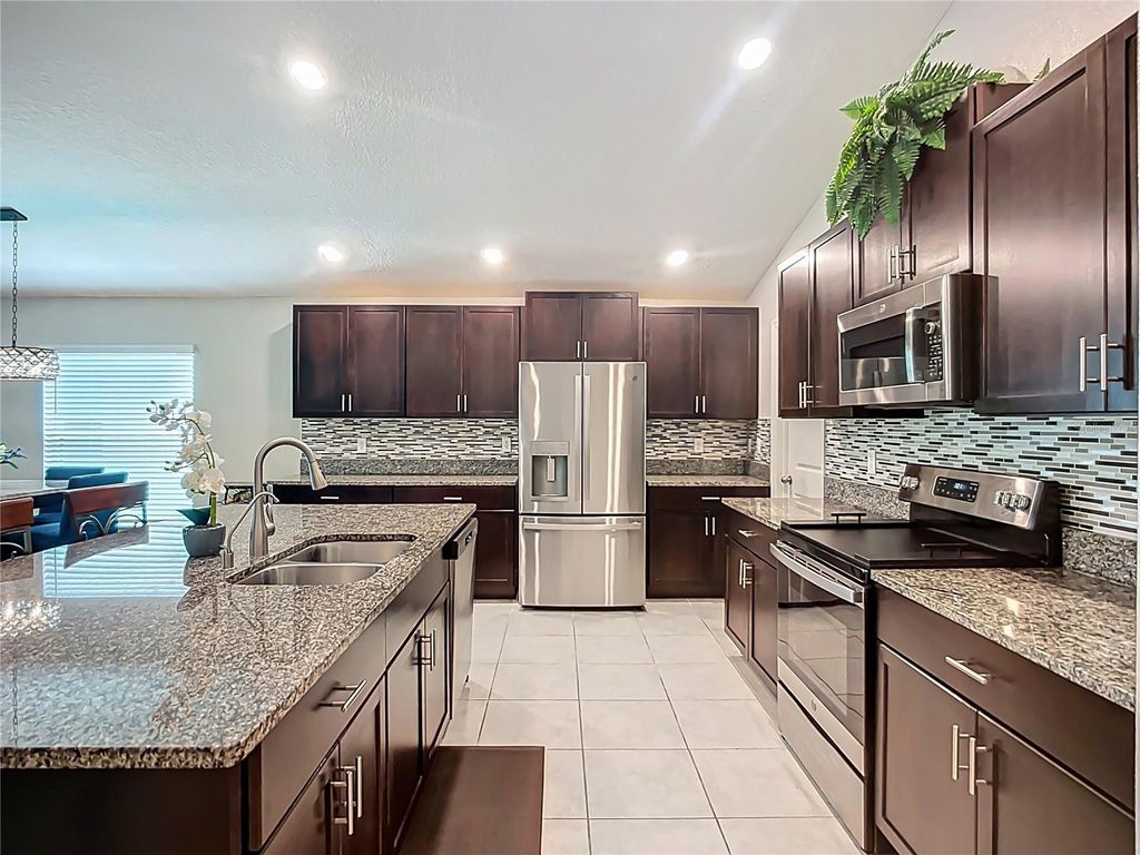 Photo of 138 Rain Berry Avenue, Ruskin, FL 33570 (MLS # TB8406633)