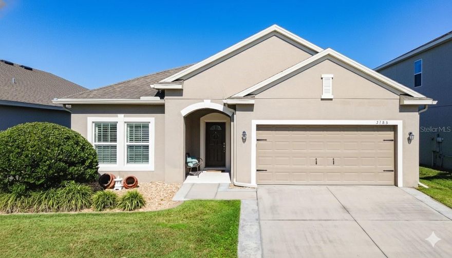 One or more photo(s) has been virtually staged. Welcome to a beautifully maintained single-story home located in one of Orlando’s thoughtfully planned and well-kept residential communities. This property offers excellent curb appeal with manicured landscaping, a welcoming covered front porch, and a neutral, timeless exterior. Inside, the home features an open-concept layout filled with natural light, highlighted by recessed lighting, plantation shutters, tile flooring throughout – No carpeting provides durability and adds modern and effortless style. The spacious great room flows seamlessly into the dining area and upgraded kitchen, making the home ideal for entertaining and everyday living. The kitchen showcases espresso cabinetry, quartz countertops, stainless steel appliances, white subway tile backsplash, and a large center island with seating—perfect for meal prep, gatherings, and day-to-day convenience. This split floor plan with well-appointed bedrooms offers flexibility for guests, a home office, or family living, while the bathrooms feature updated vanities and clean, modern finishes. A covered lanai opens onto a generous backyard with additional paver space, offering plenty of room for outdoor dining, play, or future enhancements. Residents enjoy beautifully landscaped surroundings, nearby parks, and easy access to top-rated schools. The location puts you minutes from the Orlando International Airport, Lake Nona’s Medical City, shopping centers, dining options, major highways, and everyday conveniences—providing a balanced lifestyle of comfort and accessibility. This home reflects true pride of ownership and offers the perfect blend of style, function, and community living in one of Orlando’s most desirable areas.