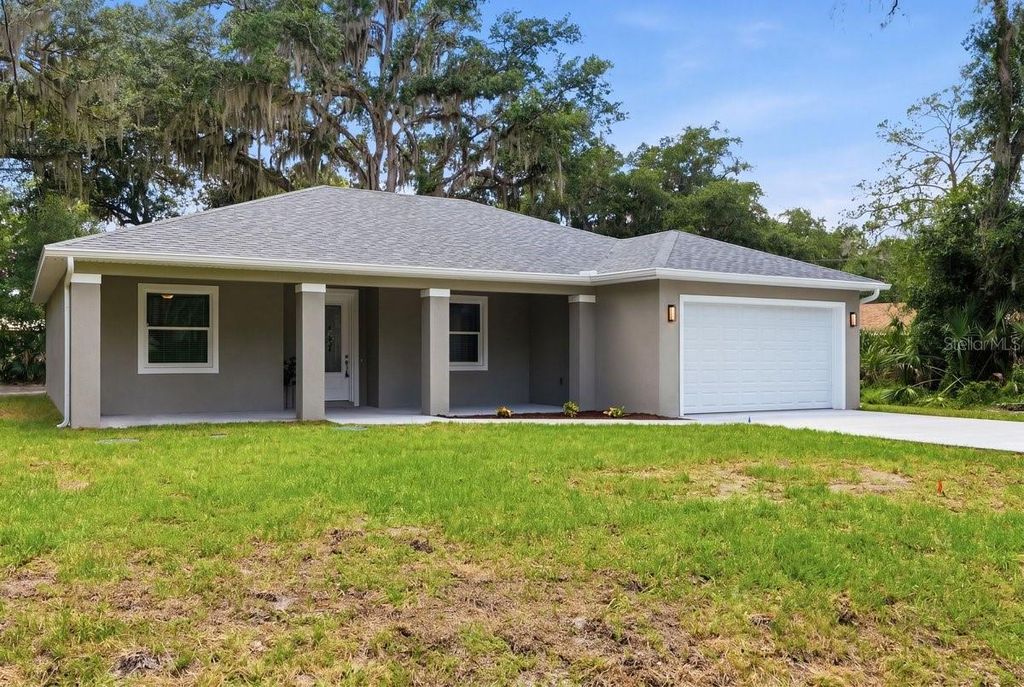 Photo of 2030 Hontoon Road, Deland, FL 32720 (MLS # V4949399)