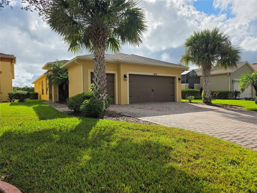 Welcome to this charming 2-bedroom, 2-bath home with a versatile office space, located in the desirable 55+ community of Solivita. This beautifully maintained home offers an inviting open floor plan, brand new carpet in the bedrooms and office, a new air handler, and a screened-in back porch perfect for relaxing or entertaining while enjoying tranquil pond views. The property also features a spacious 2-car garage with an additional third bay ideal for golf cart parking or extra storage, adding convenience and versatility. Experience a resort-style lifestyle at the Solivita Club by Avatar Properties, offering over 150,000 sq. ft. of world-class amenities, including state-of-the-art fitness centers, indoor and outdoor heated pools, tennis and pickleball courts, two 18-hole championship golf courses, walking trails, dog parks, on-site dining, art studios, community gardens, and more. With a man-guarded gate and an abundance of clubs, activities, and social events, Solivita delivers the ultimate active-adult living experience.