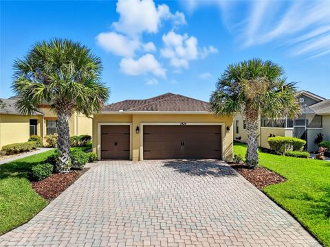 Photo of 1824 Pelican Hill Way, Poinciana, FL 34759 (MLS # O6348223)