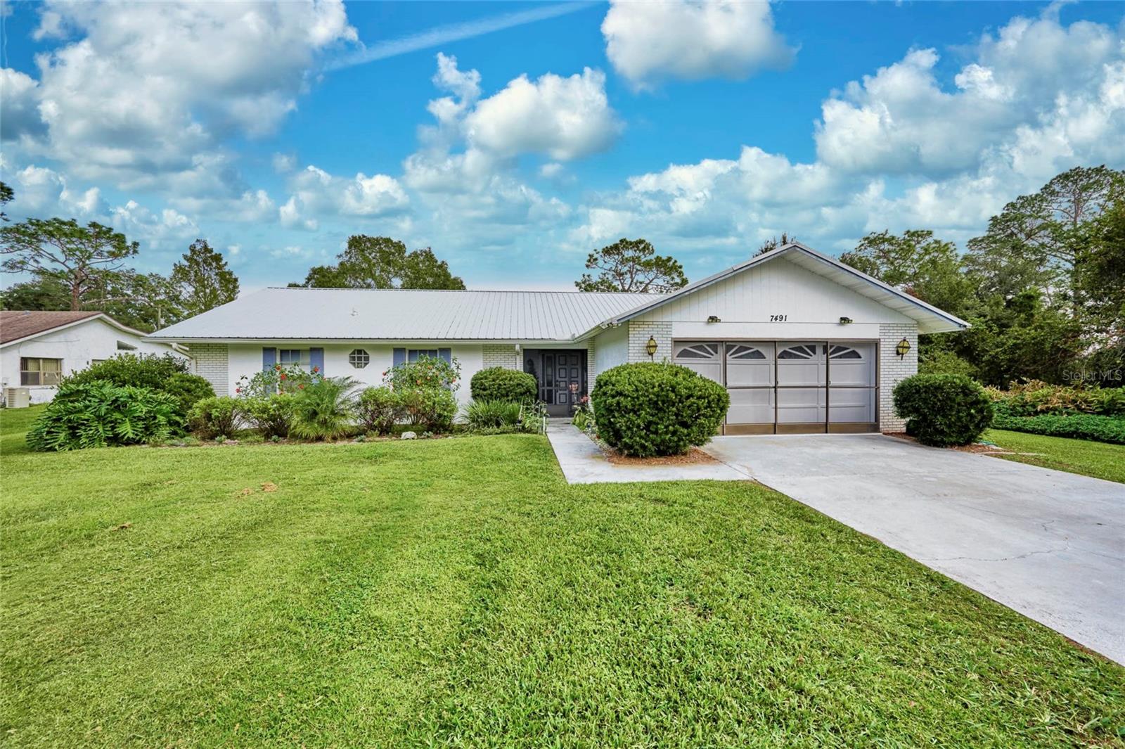 Awesome pool home in the lake and golf community of Indian Lake Estates, Polk County's best kept secret! This charmer is in a great location backing up to the golf course at hole number 5 and just a few minutes drive from the community clubhouse. There is also a golf course access just two lots down from the home! When you walk into this home, you will love the large living room and amazing views! Lots of natural light pours into the living room! The master bedroom has more than ample space and will accommodate all of your furniture pieces. The full ensuite bathroom and walk-in closet rounds out this space. On the other side of the home are two bedrooms and full guest bath. The layout offers space and privacy for family and friends. The kitchen has a serving window that opens out to the Florida room and sliders that also access the Florida room that provides a wonderful space to entertain! The pool and lanai area are screened and will sure to be a favorite gathering spot on those warm Florida days! Notable features and upgrades include a new metal roof installed in 2019, house painted in 2021, pool resurfaced and new salt system in 2021, new pool heater in 2022. The Florida room was updated in 2019 with new windows, sliding doors, ceiling fan and lights. Washing machine replaced in 2023, dryer in 2019. The hot water heater and garage door replaced in 2022. New guest bath toilet installed in 2023. The refrigerator replaced in 2022. The septic cleaned and pumped in 2023. When you are not enjoying this sweet home, Lake Walk In Water is just a 10-minute drive away where you can enjoy boating and fishing and the most magnificent sunsets while sitting on the longest fresh water pier in the State of Florida! If you want to enjoy Florida living at its best, this is where you want to invest! Located about 20 miles east of Lake Wales, the community surrounds the 7,500 acre lake locally known as Lake Walk In Water and considered to be one of the best fishing lakes in all Florida. The community has a beach, boat ramp, boat marina and pavilion. The pavilion is located at the front of the pier and is complete with propane grills and covered picnic tables. Amenities include an 18 and 9-hole golf course, basketball and tennis courts, playground, 23,000 sq.ft. clubhouse, cafe, post office, churches, library, fitness room and pro shop. If you love nature and the peace and quiet of the country you're in luck. Wildlife is plentiful! You will see deer, raccoon, turkey, turtles, eagles, cranes and various species of birds that call Indian Lake Estates their home. Orlando and Disney is only about an hour's drive north and Tampa, Busch Gardens, and the Gulf's pristine beaches only a little over an hour west. Historic Bok Tower, a National Landmark, is in nearby Lake Wales and the Westgate River Ranch Resort and Rodeo is just six miles away. An authentic Florida dude ranch and full-service resort offering guests the opportunity to experience "Old Florida." Enjoy camping, hiking, fishing and boating at Lake Kissimmee State Park. Come out and see how great life can be at Indian Lake Estates! Live the country life, experience the tranquility, but never be more than an hour away from it all.
