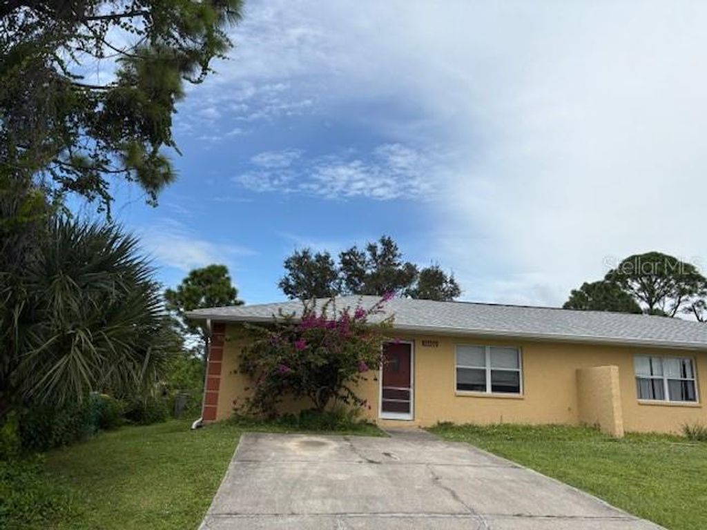 Photo of 10400 Kidron Avenue, Englewood, FL 34224 (MLS # D6144122)