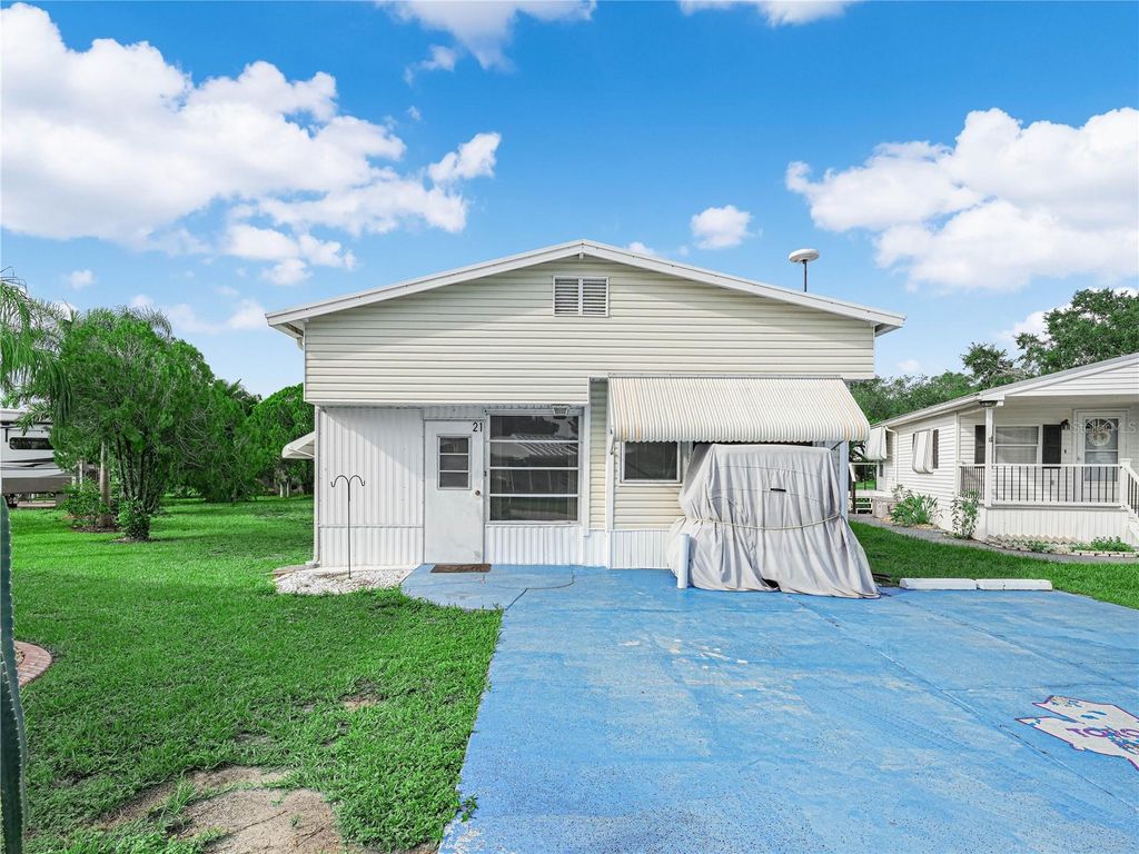 Photo of 21 Saddlebag Trail S, Lake Wales, FL 33898 (MLS # K4903046)