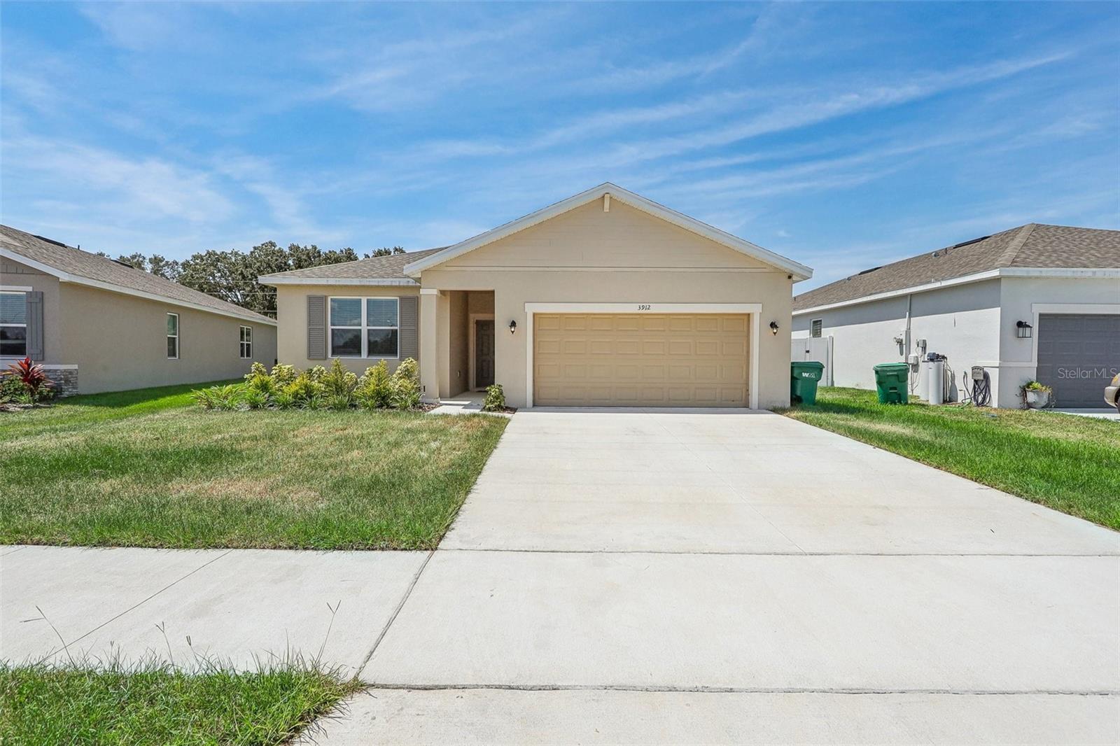 Welcome to your dream home in the Heart of the Mayhill Community! This homes invites you with an amazing open concept layout with a split floorplan for the bedrooms. As you step inside, you’re greeted by a foyer with high ceilings and tile flooring throughout the main living areas. The kitchen faces the great room and is perfect for entertaining. The secluded primary suite offers the perfect retreat, featuring dual vanities, luxurious en-suite bathroom and a spacious walk-in closet. Step outside to a tranquil patio space, ideal for morning coffee, evening breezes, or simply soaking in the serenity of nature. Located just minutes from major highways, Mount Dora, Tavares, and the rapidly growing Eustis, you’ll have quick access to shopping, dining, the chain of lakes, charming historic downtowns, and year-round events and festivals. Make this home your next oasis!