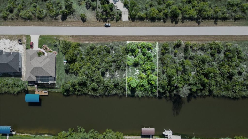 Photo of 15480 Aribe Avenue, Port Charlotte, FL 33981 (MLS # L4959585)