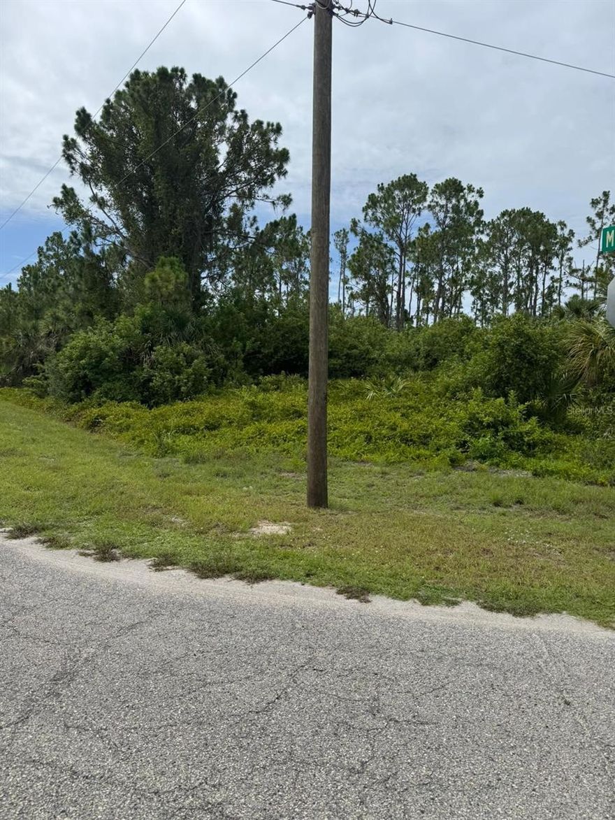 Oversized building lot available on Mattox Circle! This 0.33-acre pie-shaped property offers plenty of room for a large home and pool. Located in a quiet neighborhood close to schools, shopping, and I-75. No HOA/CDD. Secure your land today in growing North Port! this Lot is not on the North Port Identified Scrubjay Lots List