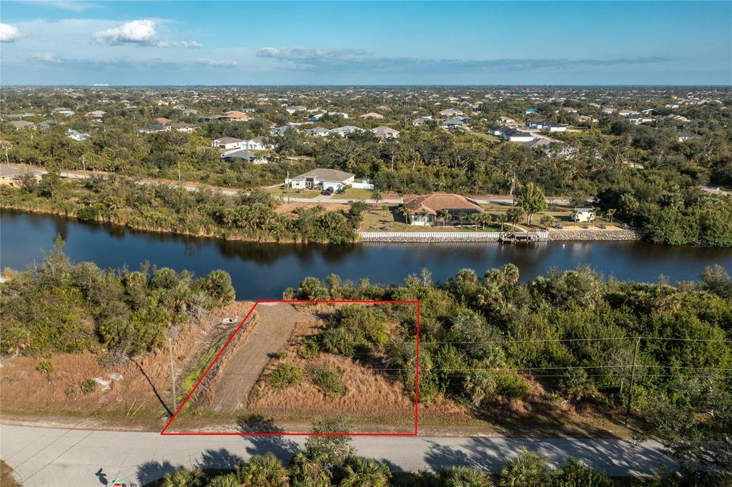 Photo of 10136 Cocoa Beach Street, Port Charlotte, FL 33981 (MLS # D6135128)