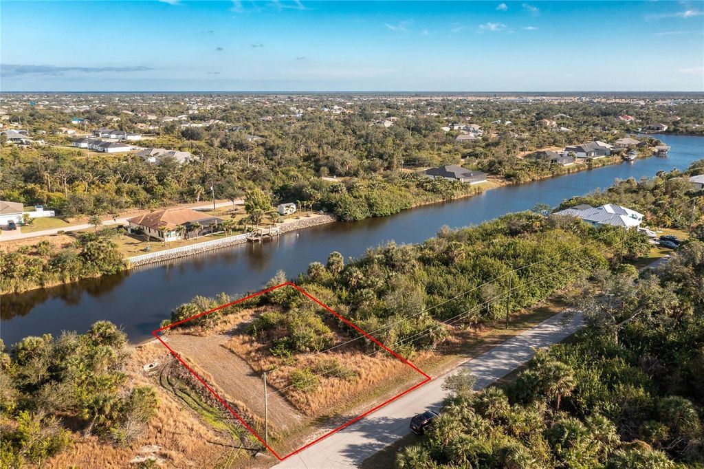 Photo of 10136 Cocoa Beach Street, Port Charlotte, FL 33981 (MLS # D6135128)