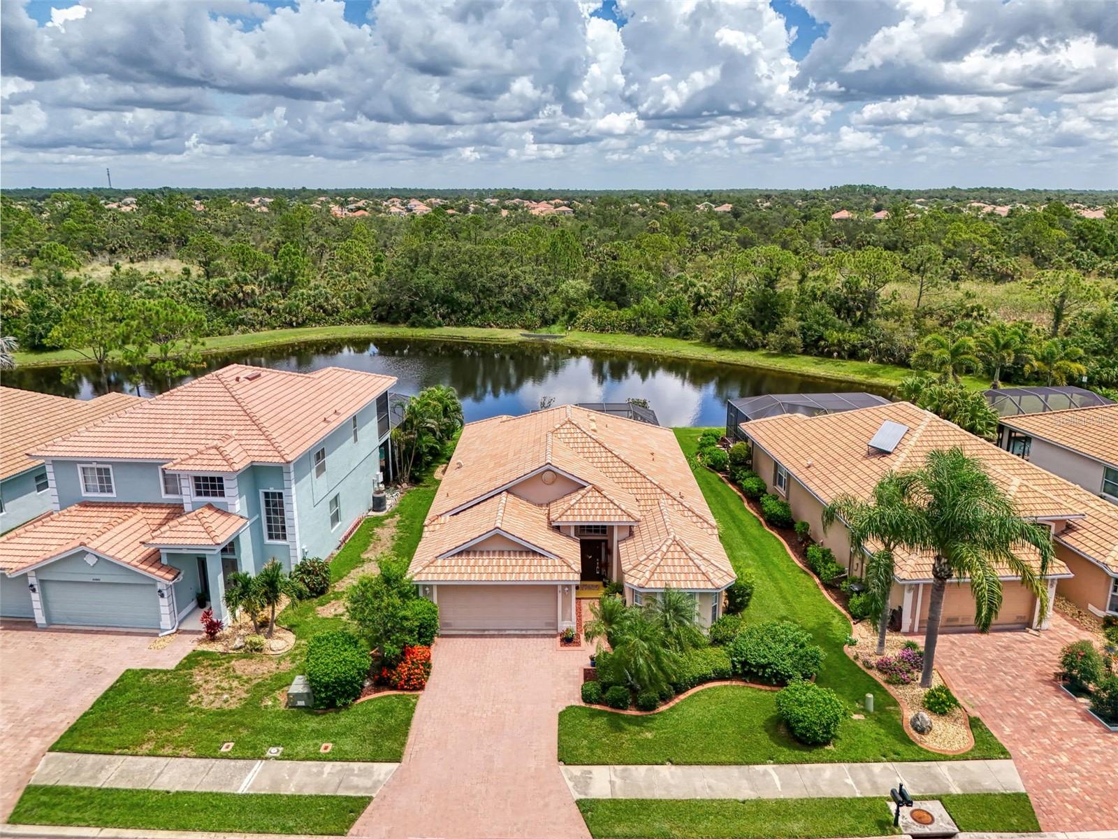 One of the best locations in all of Stoneybrook of Venice with lake and preserve views in back and preserve views in front! BRAND NEW HVAC 2025! This spacious 1,878 sq. ft. home offers 2 bedrooms, 2 bathrooms, plus a large versatile den/office that can easily be converted into a third bedroom to suit your needs. Fully furnished and move-in-ready to make your move effortless and stress-free! The open and bright floor plan features a well-appointed kitchen with breakfast bar and cozy dinette. A formal dining area for larger occasions plus two distinct living spaces add additional flexibility. The primary bedroom suite features a walk-in closet and en-suite bath, complete with dual vanities, a luxurious soaker tub, and a walk-in shower. Plantation-style shutters throughout add elegance and convenience. Soak up the Florida sunshine on the extended screened lanai while taking in stunning lake and preserve views. Hurricane shutters included for peace of mind. Enjoy low HOA fees and a prime location in Venice with easy access to shopping, dining, Gulf Coast beaches, historic downtown Venice, and Wellen Park. Stoneybrook offers resort-style amenities, including a clubhouse, resort pool and spa, tennis and pickleball courts, basketball court, sand volleyball, baseball diamond, and soccer field. Everything you need for an active and vibrant lifestyle! Don’t miss out; schedule a tour today and experience this incredible home for yourself!