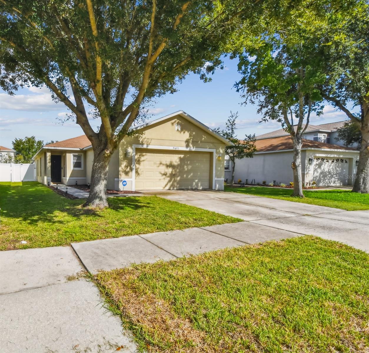 A move-in ready and affordable home in the desirable community of Asbel Estates. A three bedroom, two bathroom, and two car garage home. A new roof will be installed before closing at the Seller's expense. If Buyer wishes to purchase the home with the existing roof, it has no issues, home will be appropriately discounted. The common areas in the home have vinyl flooring and the bedrooms are carpeted. The kitchen has stainless steel appliances and a deep sink. All rooms have ceiling fans and blinds. The backyard is fully fenced. All flooring and appliances are relatively new at approximately one year of age. The home is not in a flood zone. HOA regulations limit new investment rentals to 20 percent of the community. There is no CDD fee and the HOA fee is low at $59 monthly. The community has parks, a playground, basketball/volleyball courts, and a dog park. Ideally situated just minutes from the Suncoast Parkway (approx. 10-15 minutes), with easy access to shopping, dining, business services, healthcare, and all the best of Pasco County. You're just 30 minutes to Tampa International Airport, 45 minutes to downtown Tampa, and 1 hour to Clearwater Beach. The Seller will provide a one year home warranty up to $610 for the Buyer's added piece of mind.