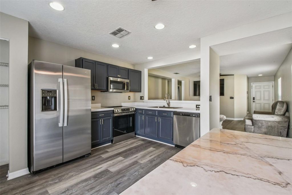 Photo of 9603 Maxson Drive, Land O Lakes, FL 34638 (MLS # TB8416332)