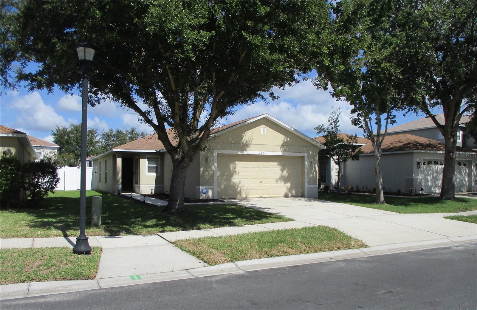 Price Reduction. A move-in ready and affordable home in the desirable community of Asbel Estates. A three bedroom, two bathroom, and two car garage home. Interest rate buy downs and/or closing cost credits will be considered. The common areas in the home have vinyl flooring and the bedrooms are carpeted. The kitchen has stainless steel appliances and a deep sink. All rooms have ceiling fans and blinds. The backyard is fully fenced. All flooring and appliances are relatively new at approximately one year of age. The home is not in a flood zone. HOA regulations limit new investment rentals to 20 percent of the community. There is no CDD fee and the HOA fee is low at $59 monthly. The community has parks, a playground, basketball/volleyball courts, and a dog park. Ideally situated just minutes from the Suncoast Parkway (approx. 10-15 minutes), with easy access to shopping, dining, business services, healthcare, and all the best of Pasco County. You're just 30 minutes to Tampa International Airport, 45 minutes to downtown Tampa, and 1 hour to Clearwater Beach. The Seller will provide a one year home warranty up to $610 for the Buyer's added piece of mind.