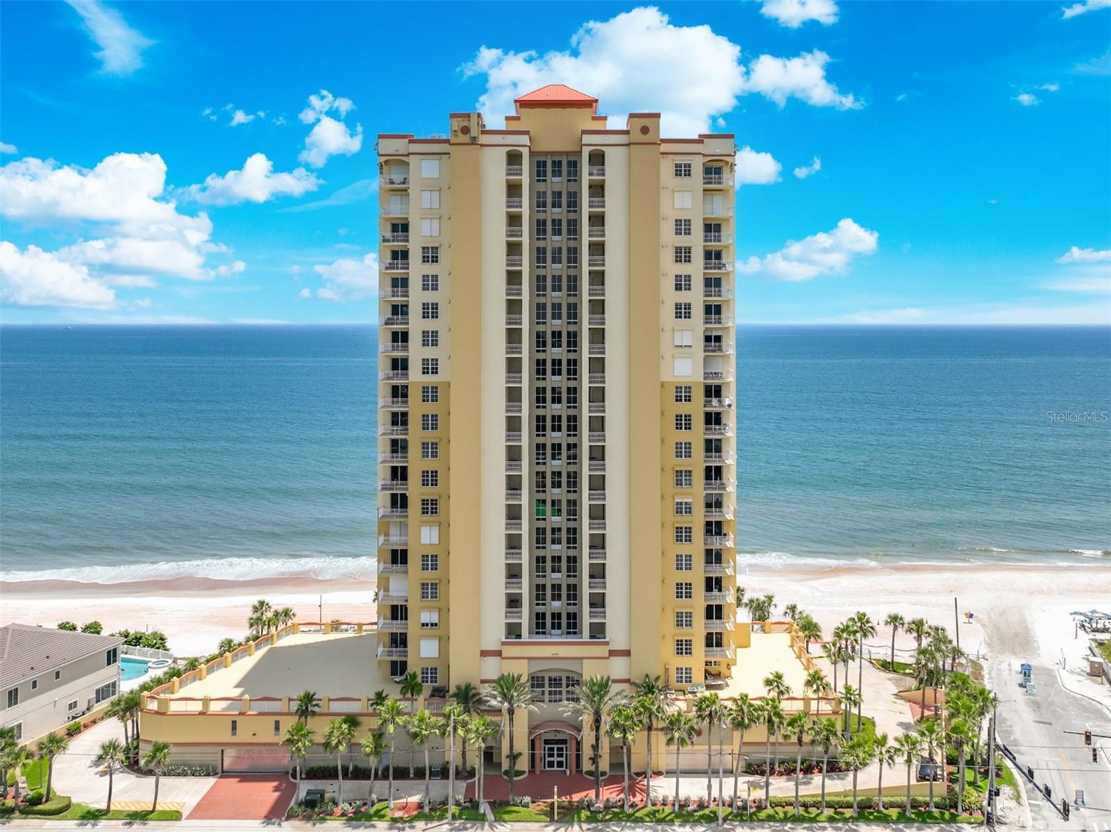 STUNNING DIRECT OCEANFRONT AND LUXURIOUS HOME DESIGN THAT EXUDES ELEGANCE AND MODERNITY. THIS LUXURIOUS CONDOMINIUM HOME IS EXPERTLY CRAFTED WITH ATTENTION TO DETAIL, COMBINING ARCHITECTURAL EXCELLENCE WITH FUNCTIONAL LIVING SPACES. WALLS REMOVED AND UPGRADES IN PLACE, EVERY ROOM SHOWCASES PICTURESQUE OCEAN VIEWS & BALCONY ACCESS. THE SECURE ACCESS ELEVATOR OPENS TO AN INTERIOR ELEVATOR VESTIBULE THAT LEADS TO THE ELEGANTLY APPOINTED OPEN-CONCEPT FLOOR PLAN THAT SEAMLESSLY CONNECTS THE MAIN LIVING AREAS WITH THE OUTDOORS, CREATING AN IDEAL SPACE FOR ENTERTAINING AND FAMILY GATHERINGS. CUSTOM CABINETRY, QUARTZ COUNTERTOPS, COORDINATING BACKSPLASH, A LARGE, CENTER ISLAND MAKES THIS KITCHEN BOTH BEAUTIFUL AND BRILLIANTLY FUNCTIONAL. DECORATOR LIGHTING BEAUTIFULLY HIGHLIGHTS THE DINING AREA, WHILE REMOTE SHADES AND CUSTOMIZED DRAPES ADORN THE GRAND LIVING ROOM THAT EXTENDS TO THE RECESSED BALCONY WHERE YOU CAN ENJOY THE SIGHTS AND SOUNDS OF THE OCEAN IN COMPLETE PRIVACY.
WAKE TO THE PELICANS FLYING BY AND ROCKET LAUNCHES LATER IN THE DAY. BOTH OCEANFRONT BEDROOMS ARE EQUIPPED WITH WALK-IN CLOSETS AND SPA STYLE BATHS. NATURAL LIGHT FILLS THE LIVING AREAS, ENHANCED BY HURRICANE SHUTTERS. ENTERTAINMENT-READY ACROSS FROM THE BELLAIR PLAZA, HOME TO PUBLIX, RESTAURANTS, WALGREENS, A WIDE ARRAY OF SHOPPING, NAIL SALONS AND ICE CREAM PARLORS.
RICH IN AMENITIES, THE MEDITERRANEAN OFFERS 2 DEDICATED GYMS, A TROPICAL OCEANFRONT SWIMMING POOL AND SPA WITH PRIVATE BEACH ACCESS, A SOCIAL ROOM A GAME ROOM, THEATRE ROOM AND LARGE PARTY TERRACE. PROFESSIONAL ON-SITE MANAGEMENT MAINTAINS THE EXCLUSIVE, QUIET LUXURY THAT DEFINES THE EVERYDAY EXPERIENCE.
ENJOY PRIVACY AND EXCLUSIVITY WITH ONLY 3 UNITS PER FLOOR, PLUS AN ASSIGNED PARKING SPACE AND STORAGE CAGE.