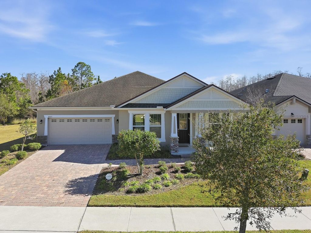 Photo of 8071 Gamemaster Avenue, Orlando, FL 32832 (MLS # O6377953)