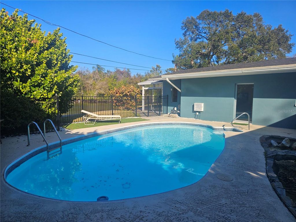 Photo of 1750 Harmony Drive, Clearwater, FL 33756 (MLS # TB8473585)