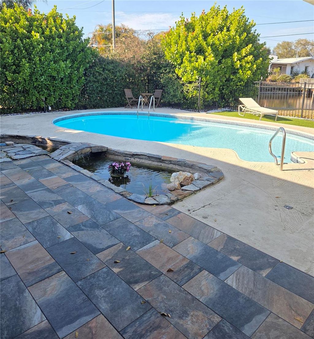 Photo of 1750 Harmony Drive, Clearwater, FL 33756 (MLS # TB8473585)