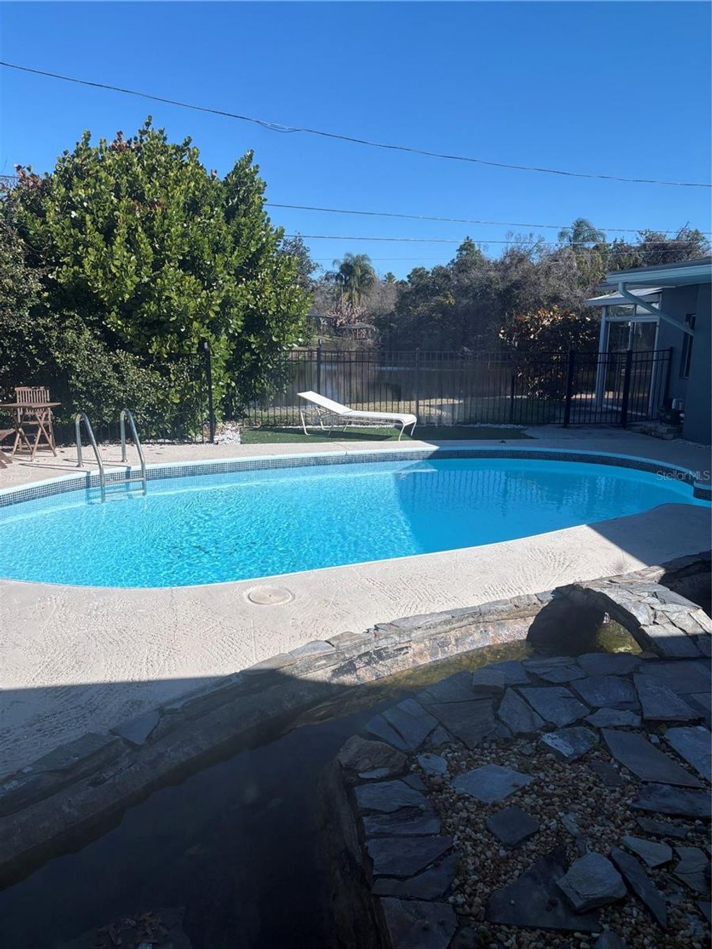 Photo of 1750 Harmony Drive, Clearwater, FL 33756 (MLS # TB8473585)