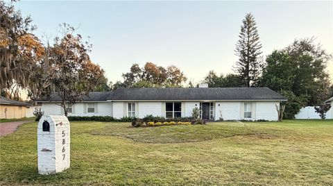 Photo of 5867 Cove Drive, Belle Isle, FL 32812 (MLS # O6360671)