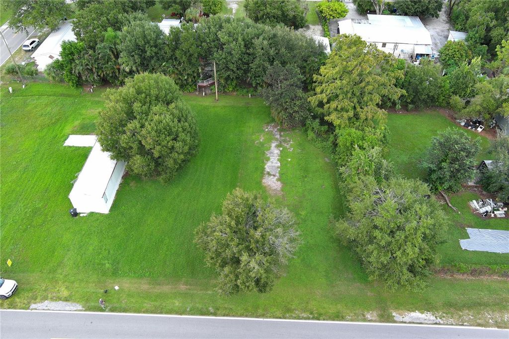 Photo of 571 Avenue D NW, Moore Haven, FL 33471 (MLS # OK225653)