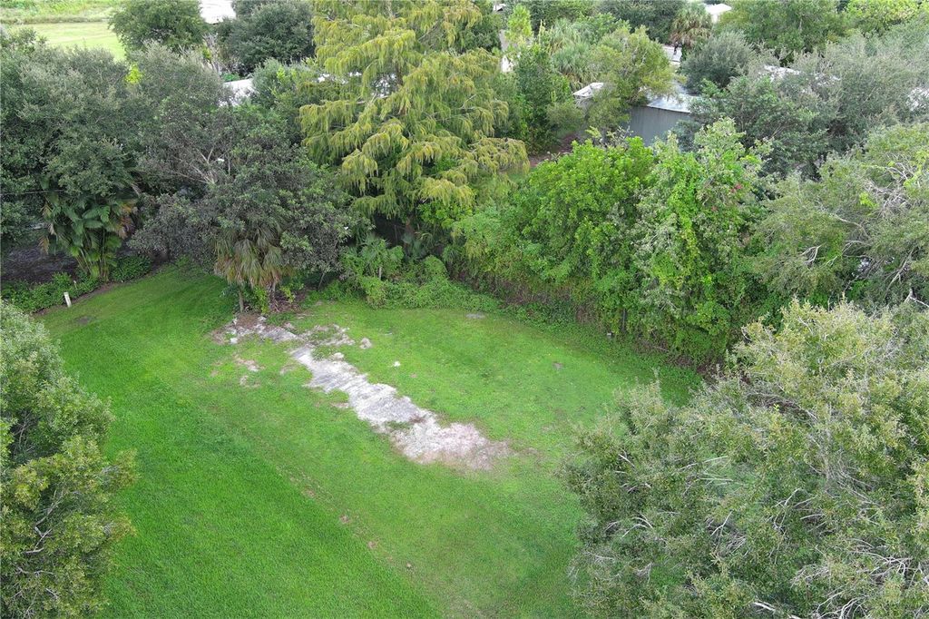 Photo of 571 Avenue D NW, Moore Haven, FL 33471 (MLS # OK225653)