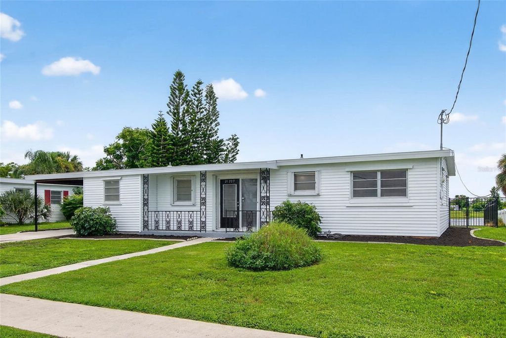 Photo of 21227 Gladis Avenue, Port Charlotte, FL 33952 (MLS # N6143297)