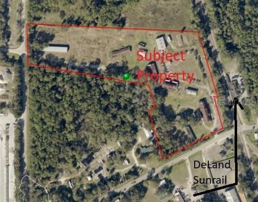 DISCOVER A POT OF GOLD AT THE END OF THE RAINBOW! This 13-ACRE property is located at the Orlando SUNRAIL station in DELAND, FLORIDA (https://www.discoverdeland.org), which has been voted the BEST SMALL TOWN IN AMERICA! Enjoy easy access to Stetson University (with football, baseball, & basketball), Deleon Springs, Blue Springs, and the St Johns River. The SUNRAIL system connects you throughout central Florida, Including Orlando, Kissimmee, with State-of-the-art, multilevel commuter rail cars that ensure safety, comfort, & convenience. This property is equipped with city water & sewer. Block buildings perfect for any Contruction office. Please note some statements here should be verified for accuracy. All information is deemed to be correct but is not warranted!