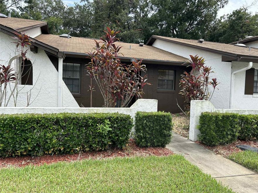 Short Sale. Short sale.  Subject to sellers lender approval.  This beautiful little community is tucked away right in the center of town! With one way in and one way out, there is very little traffic on the street. The property has a large living space with 2 carpeted bedrooms and a beautifully tiled kitchen. Sizeable back porch with all-season windows provides some extra living space and even has a storage area inside. AC was replaced in December of 2020. Community offers a clubhouse area with a pool to relax in! HOA covers all exterior maintenance and lawn care, offering a nice worry-free lifestyle. This place is ready for you to call it home!