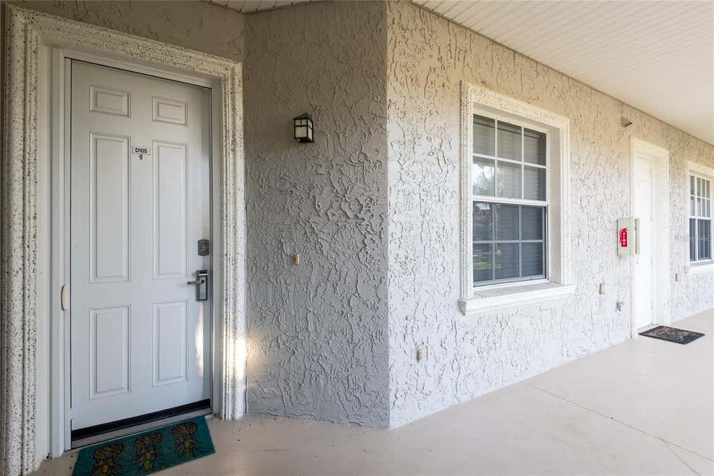 Photo of 6808 Dali Avenue #105, Land O Lakes, FL 34637 (MLS # TB8539172)