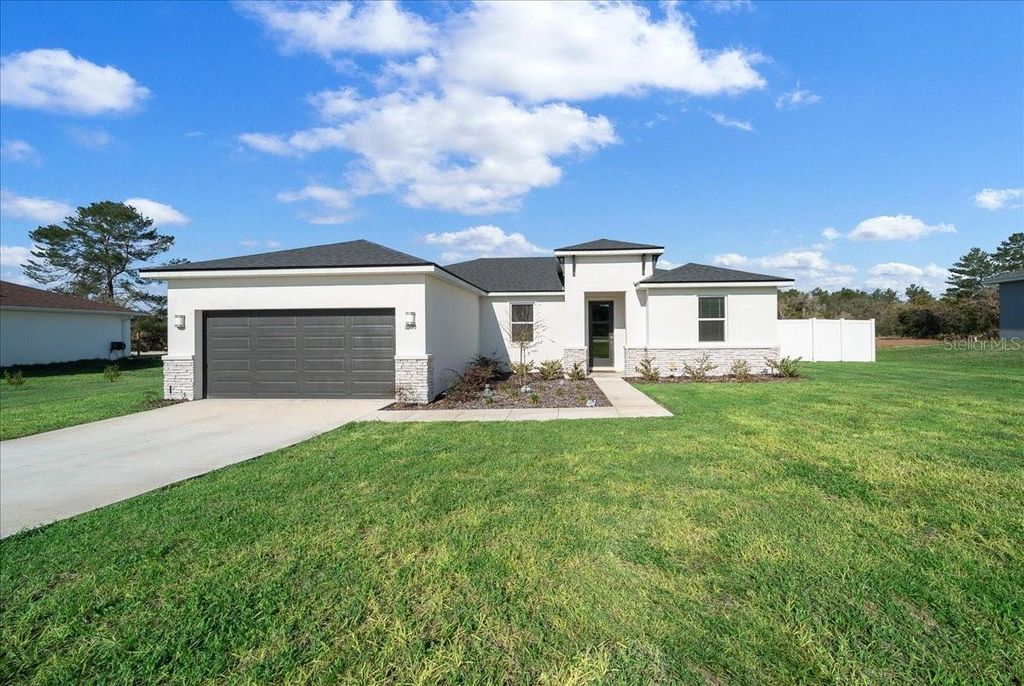 Photo of 16195 SW 48th Circle, Ocala, FL 34473 (MLS # OM721295)